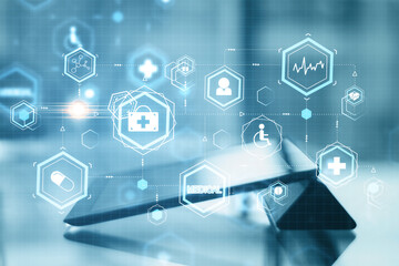 Digital tablet with creative glowing medical hologram