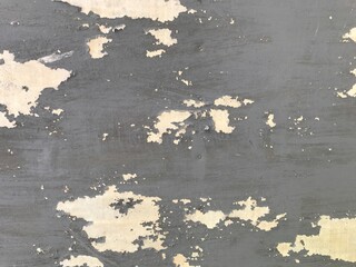 background texture of old gray paint on the white metal fence