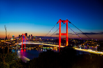 Fototapeta na wymiar Istanbul Bosphorus Bridge at night. 15th July Martyrs Bridge (15 Temmuz Sehitler Koprusu). Istanbul, Turkey.