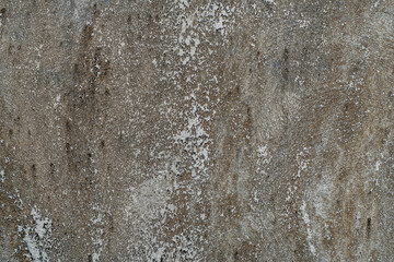 Dirty old concrete wall texture with cracks and stains dark grey watermarks