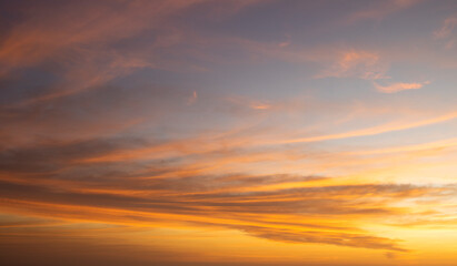 Dramatic golden pink sunset over the ocean