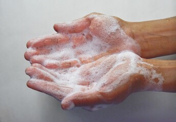 Washing hands with soap as precaution