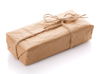 One gift box wrapped with kraft paper and burlap ribbon on a white background.