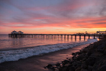 Malibu pier sunset near Los Angeles on the Southern California coast.