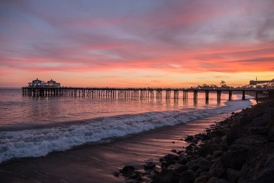 Malibu pier sunset near Los Angeles on the Southern California coast. - Powered by Adobe
