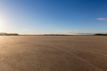 Fototapeta na wymiar Empty El Mirage dry lake bed in the Mojave desert region of scenic Southern California.