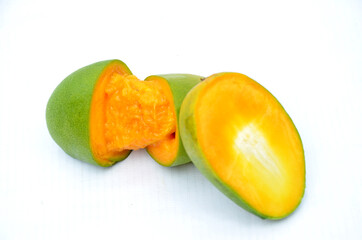 Fototapeta na wymiar sliced cutt mango isolated on white background
