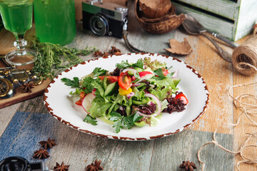 Healthy rustic garden salad of fresh vegetables