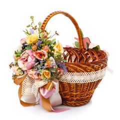 Fototapeta na wymiar Wicker design baskets are decorated with a floral arrangement for Easter. On a white background.