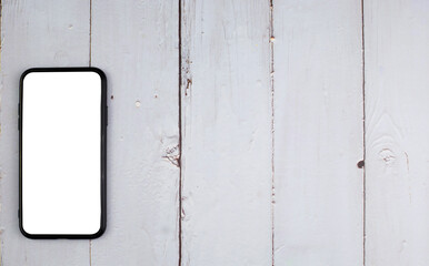 White screen phones simulate space for text advertisements, do business, communicate with people, technology located on wooden floors.