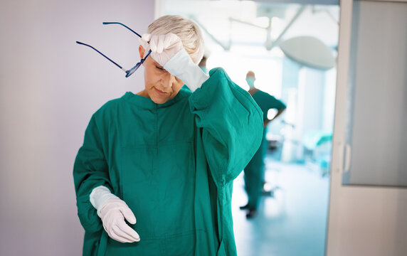 Senior surgeon after she failed an operation. Tired, overworked, people, hospital concept.