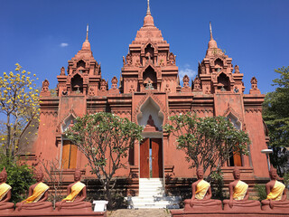 Beautiful brown temple with buddha statues