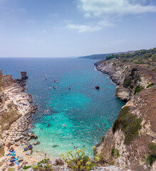 Summer seascape, Apulia coast: Salento beach: Miggiano bay. It's characterized by a alternation of sandy coves and jagged cliffs overlooking a truly clear and crystalline sea.