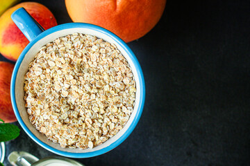 oatmeal fruit Menu concept serving size. food background top view copy space for text organic healthy eating