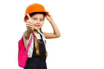 Cute little girl is isolated on white background. Girl looking at camera, wearing yellow helmet
