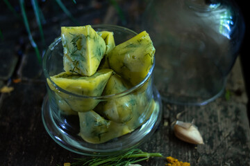 Frozen ghee butter with herbs. Frozen food