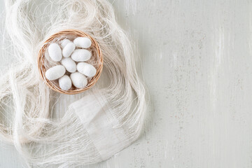 natural silkworm cocoons are source of silk thread, textile