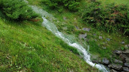 water flowing into the river