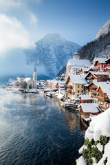 Classic view of Hallstatt with ship in winter, Salzkammergut, Austria
