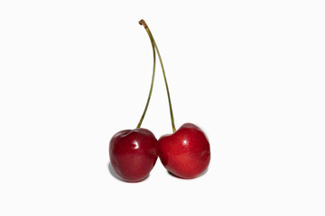 two sweet cherry isolated on white with shadow