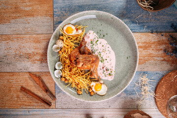 Stewed quail with pai potatoes chickpeas and eggs