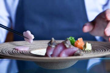 chef preparing japanese food