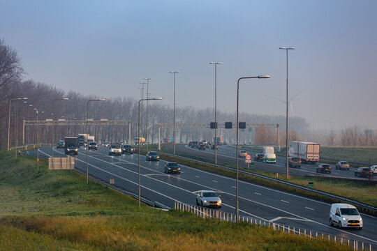 Cars on the A4 highway  near the village of Roelofarendsveen and Weteringbrug in the Netherlands.