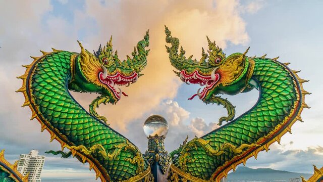 Time Lapse. Naga or serpent statue in Wat khao phra kru temple located in Sriracha city Chonburi, Thailand