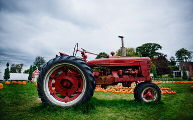 old red tractor on a farm