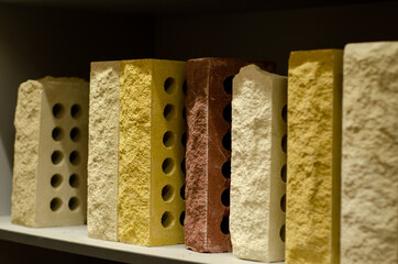 Close-up of different colored bricks