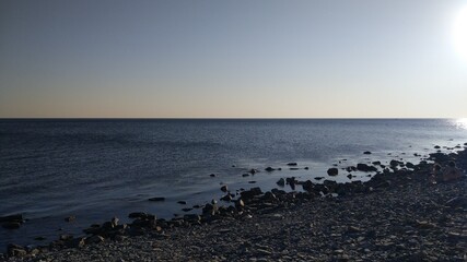 sea with stones and sky