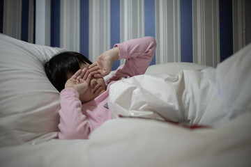 asian kid sleep on bed, sick child
