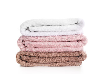 Fototapeta na wymiar Pile of rainbow colored towels isolated