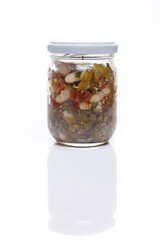 Nutrition concept - Healthy food, Diet, Detox, Clean Eating or Vegetarian concept. A nutritious food on glass jars against white background. Delicious salad in a glass jar. 