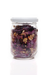 Nutrition concept - Healthy food, Diet, Detox, Clean Eating or Vegetarian concept. A nutritious food on glass jars against white background. Delicious salad in a glass jar. 