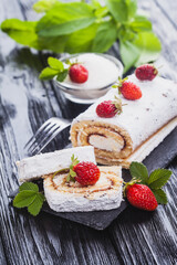 tasty strawberry dessert on a slate board on a black wooden table. Homemade Fresh Baking
