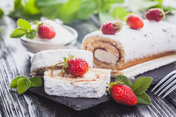 tasty strawberry dessert on a slate board on a black wooden table. Homemade Fresh Baking