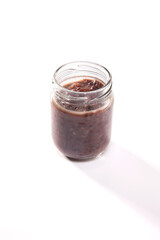 Nutrition concept - Healthy food, Diet, Detox, Clean Eating or Vegetarian concept. A nutritious food on glass jars against white background.