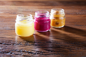 Nutrition concept - Healthy food, Diet, Detox, Clean Eating or Vegetarian concept. A glass jar of nutritious food against wooden background. Delicious take away food in glass jars.