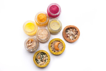 Nutrition concept - Healthy food, Diet, Detox, Clean Eating or Vegetarian concept. Glasses of food and small quiches. Nutritious food against white background. 