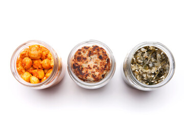 Nutrition concept - Healthy food, Diet, Detox, Clean Eating or Vegetarian concept. A glass jar of nutritious food against white background. Delicious take away food in glass jars.