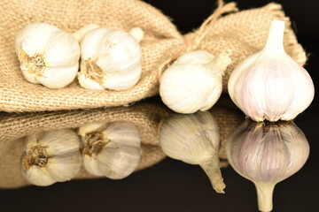 garlic on black background