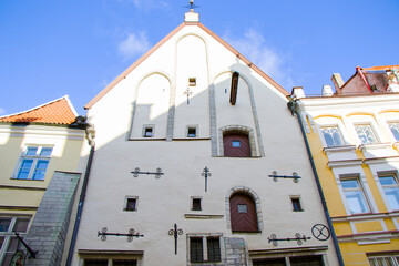 Buildings and architecture exterior view in old town of Tallinn, colorful old style houses and street situation. Tallinn, Estonia.