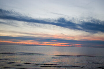 Obraz premium Baltic's sea and Parnu beach at sunset, Estonia.
