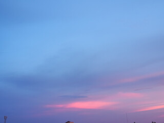 Background of colorful sky concept: Dramatic sunset with twilight color sky and clouds