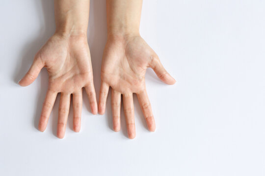 Gesture and sign. Empty palms on a white background. Two arms. Empty space for text
