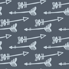 Obraz premium Hand drawn arrows seamless pattern on gray background. Tribal wallpaper. Doodle style.