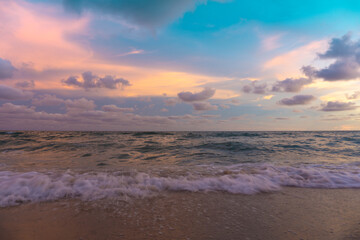 Fototapeta na wymiar Summer background with beautiful sunset seascape on the beach view.