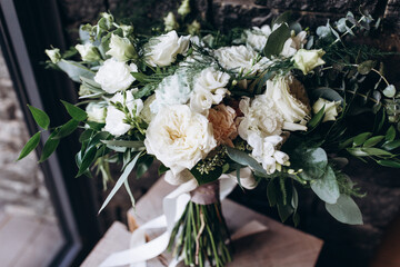 Wedding bouquet of white roses.
