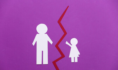 Deprivation of parental rights. Split paper doughter and father on purple background